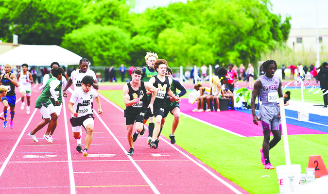 Zach Ainsworth takes the baton in a race for state